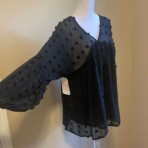 Beautiful and flowy long black shirt.